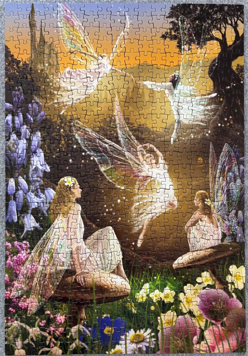 A fantasy illustration of several fairies in a magical garden at sunset.