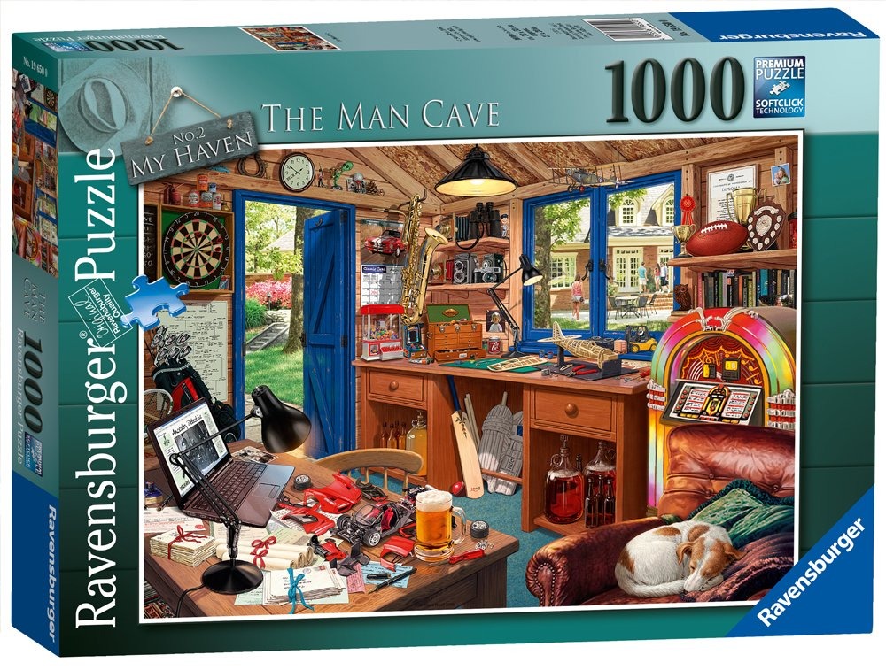 A cozy, cluttered man cave room filled with hobbies, a jukebox, and a sleeping dog, looking out into a sunny backyard.
