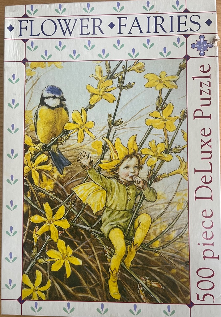 An illustration of a small fairy in a green suit and a blue tit bird perched among bright yellow winter jasmine flowers.