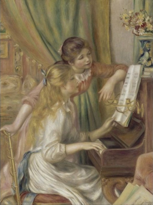 A blonde girl playing the piano while a brunette girl leans over her shoulder to look at the music.