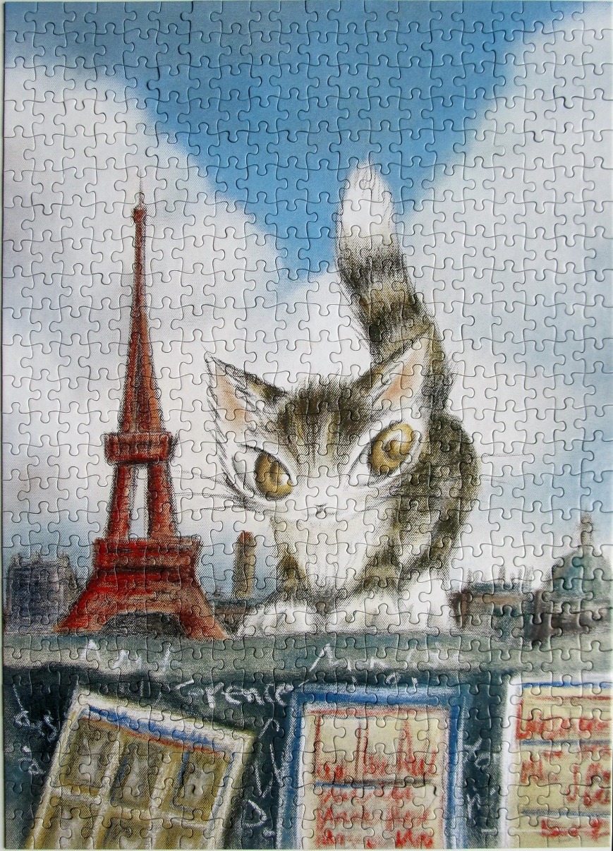 A whimsical illustration of a giant tabby cat looking over the Paris skyline and the Eiffel Tower.