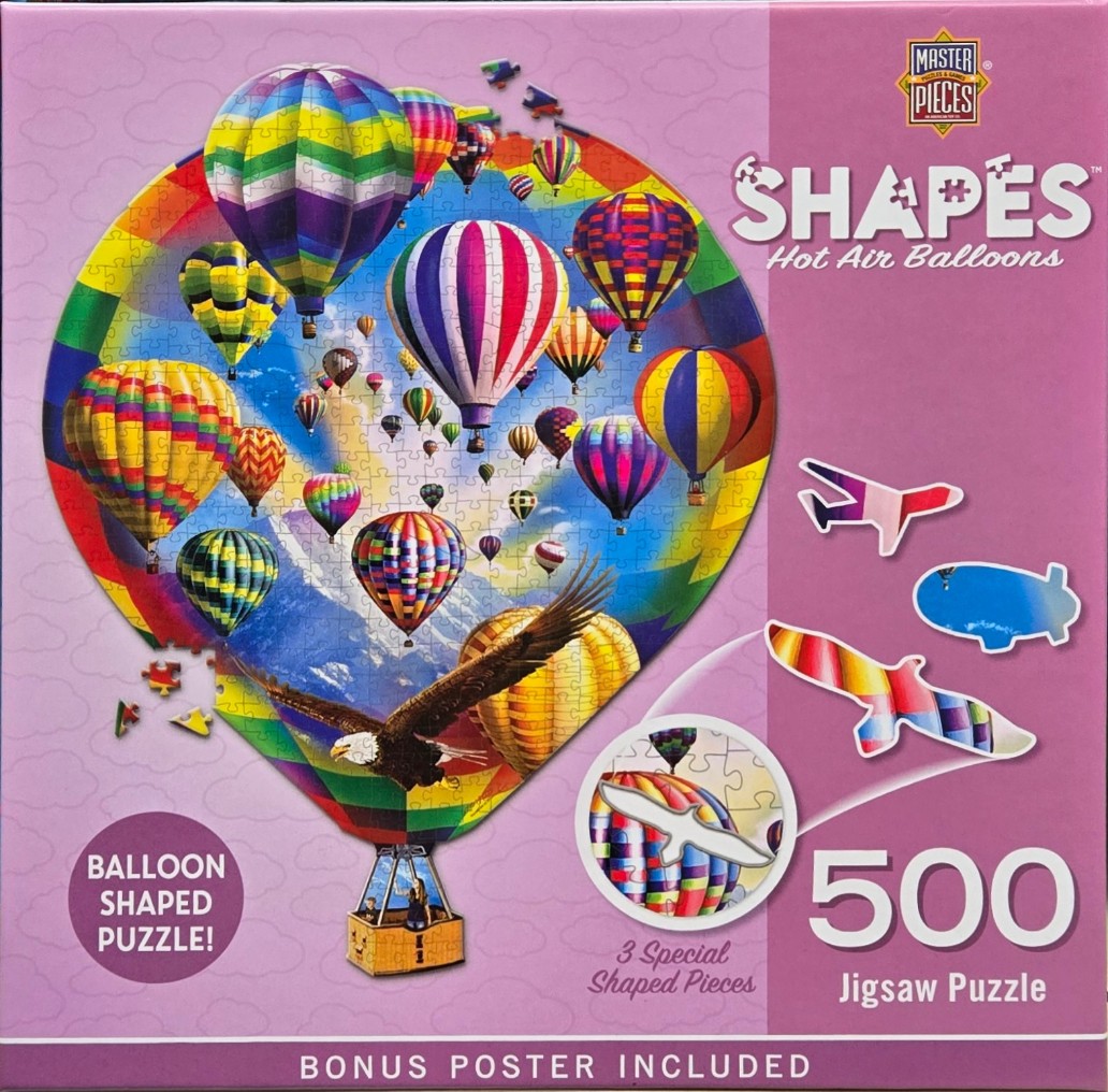 A heart-shaped collage of colorful hot air balloons in a blue sky with a bald eagle soaring in the foreground.