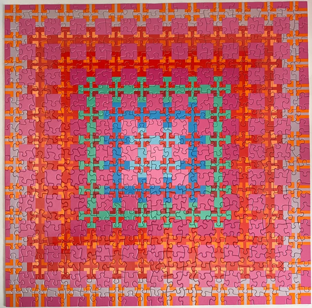 A geometric abstract composition of a nested grid pattern in vibrant shades of pink, orange, red, blue, and green.