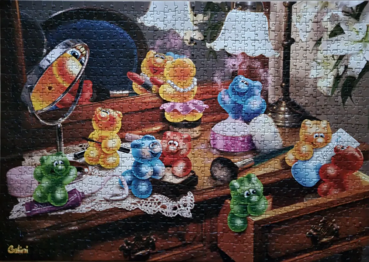 Colorful gummy bear characters interacting with makeup items on a dark wooden vanity.