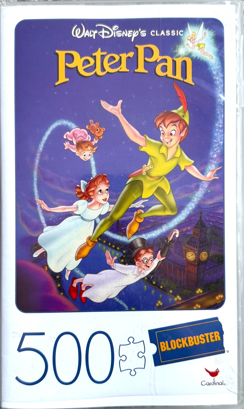 Peter Pan, Wendy, John, and Michael flying above London, with Tinker Bell in the corner.