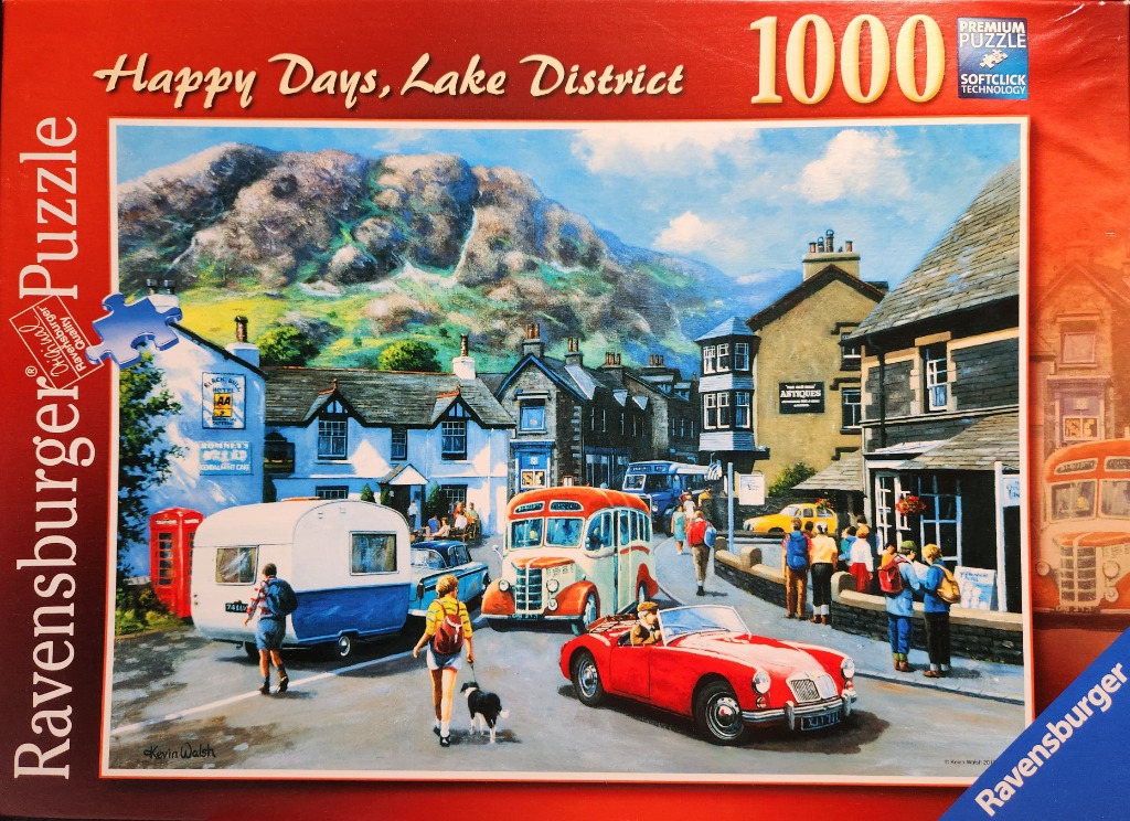 A nostalgic painting of a quaint Lake District town scene featuring vintage cars, a caravan, and a bus.