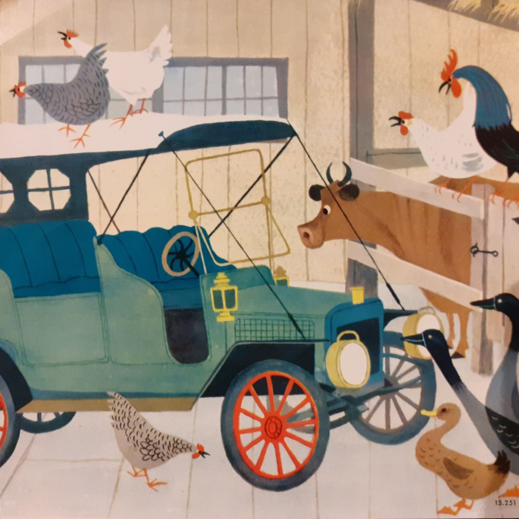 Vintage teal car parked in a barn with farm animals