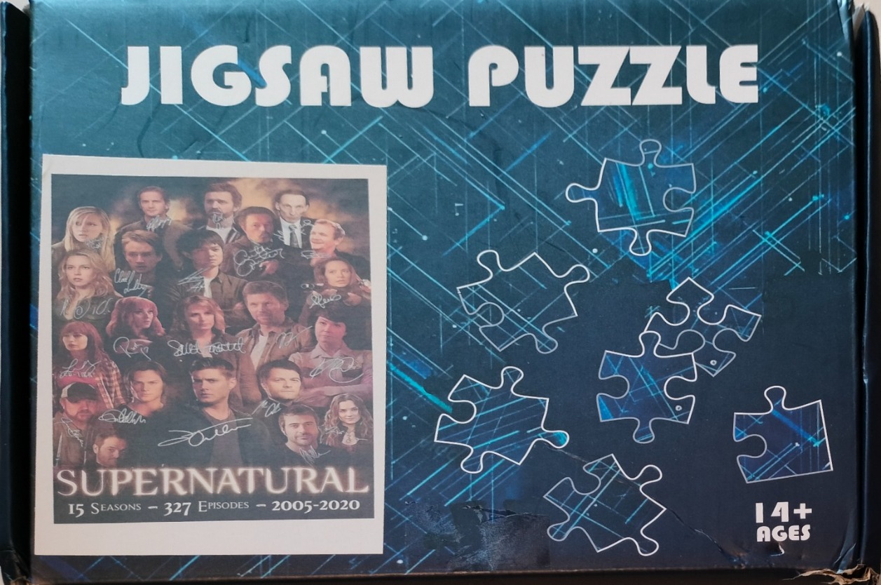 Cast collage of the TV show Supernatural, featuring signed photos of actors over a dark blue digital circuit background.