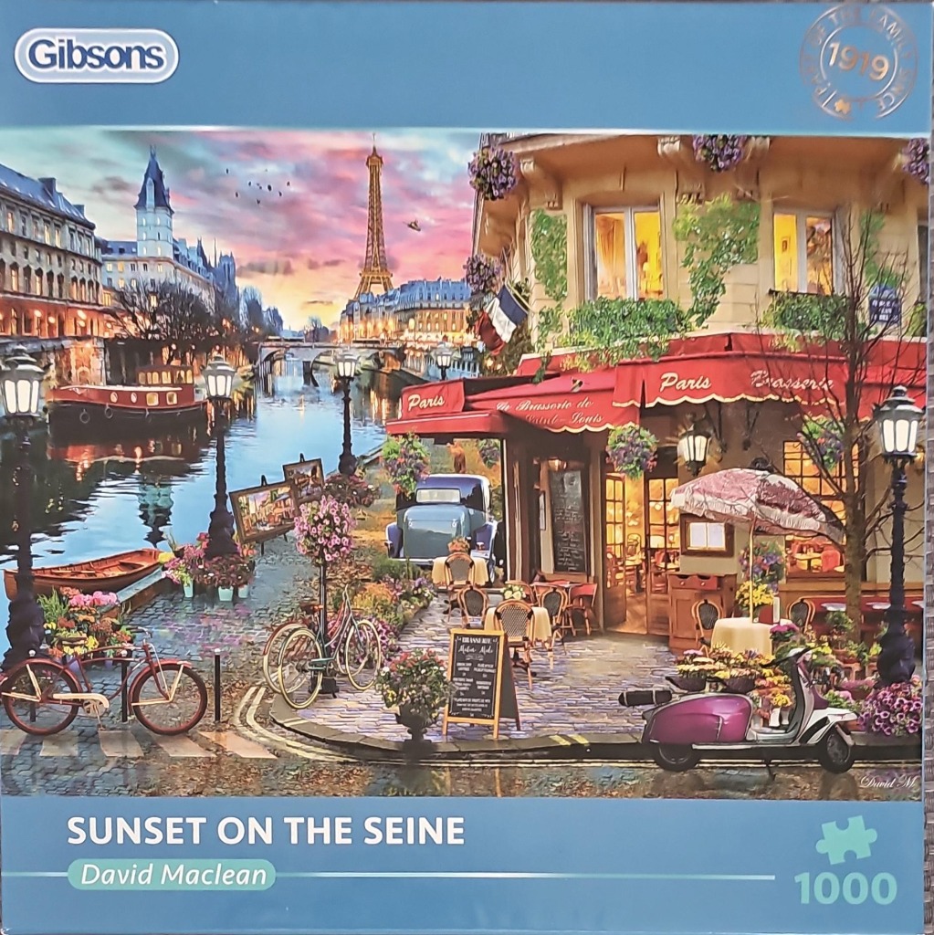 Painting of a Parisian riverside scene at sunset with a brasserie, the Eiffel Tower in the distance, and vintage vehicles.