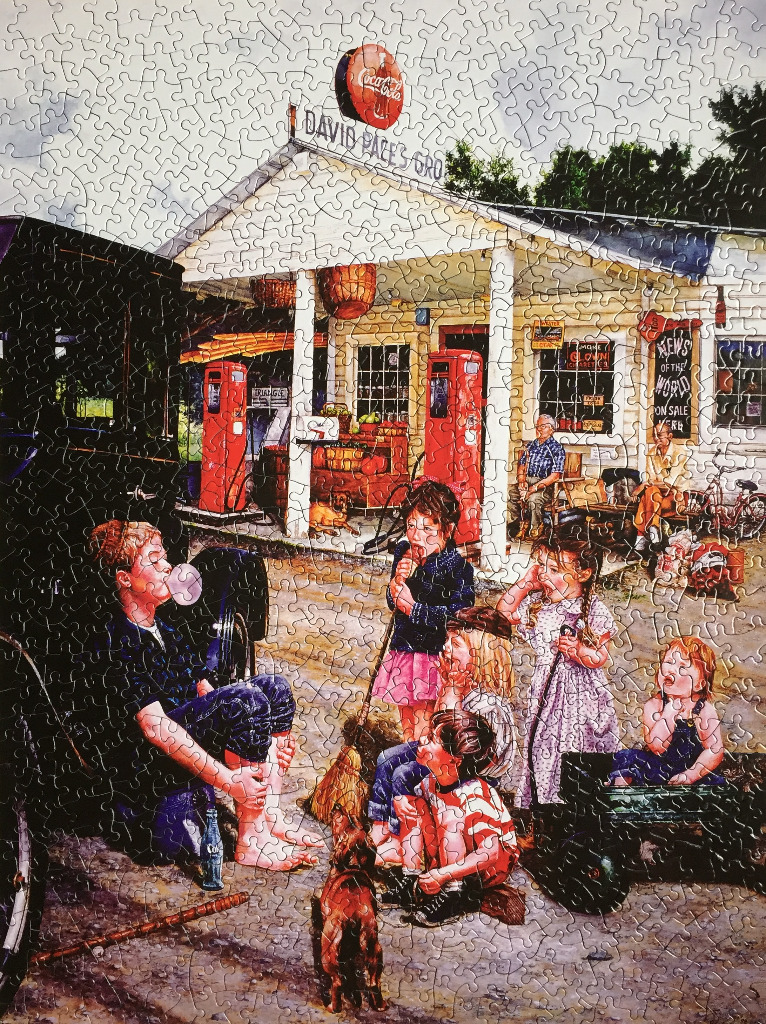 A rural country store scene with children playing outside, featuring vintage red gas pumps and a Coca-Cola sign.