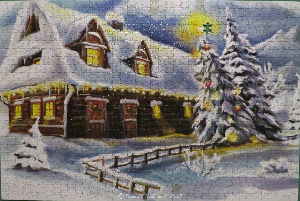 A cozy log cabin in a snowy winter landscape with a decorated Christmas tree at twilight.