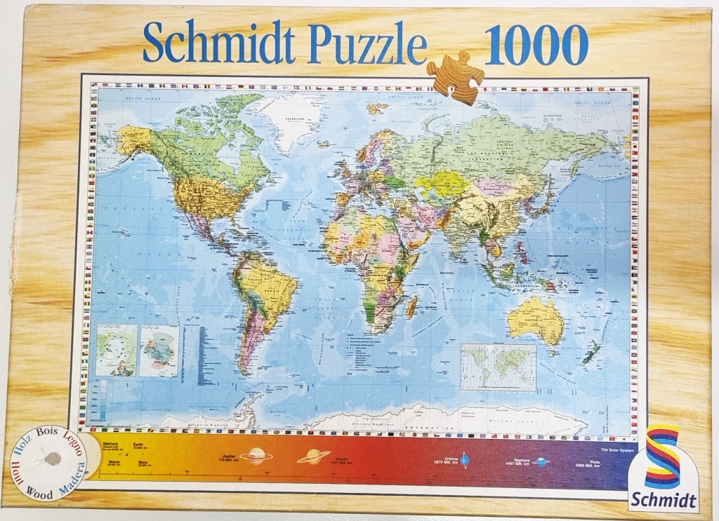 A detailed physical world map with a colorful solar system border at the bottom.