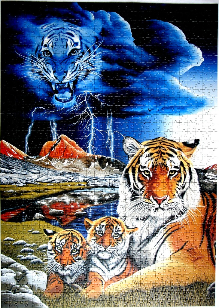 A mother tiger and two cubs in a landscape with a ghostly tiger face in the clouds above.