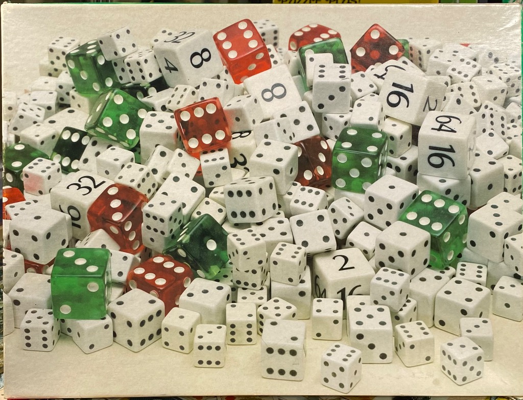 A pile of numerous scattered white, translucent green, and translucent red dice of various sizes.