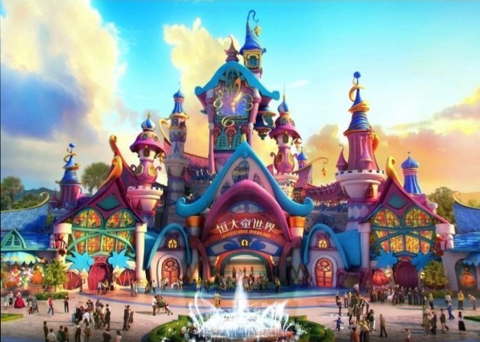 A vibrant, whimsical fantasy castle with colorful turrets and a central clock tower set against a bright sky.