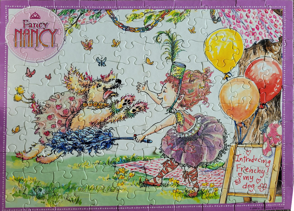 An illustration of Fancy Nancy playing with a fluffy dog outdoors with balloons and a chalkboard sign.