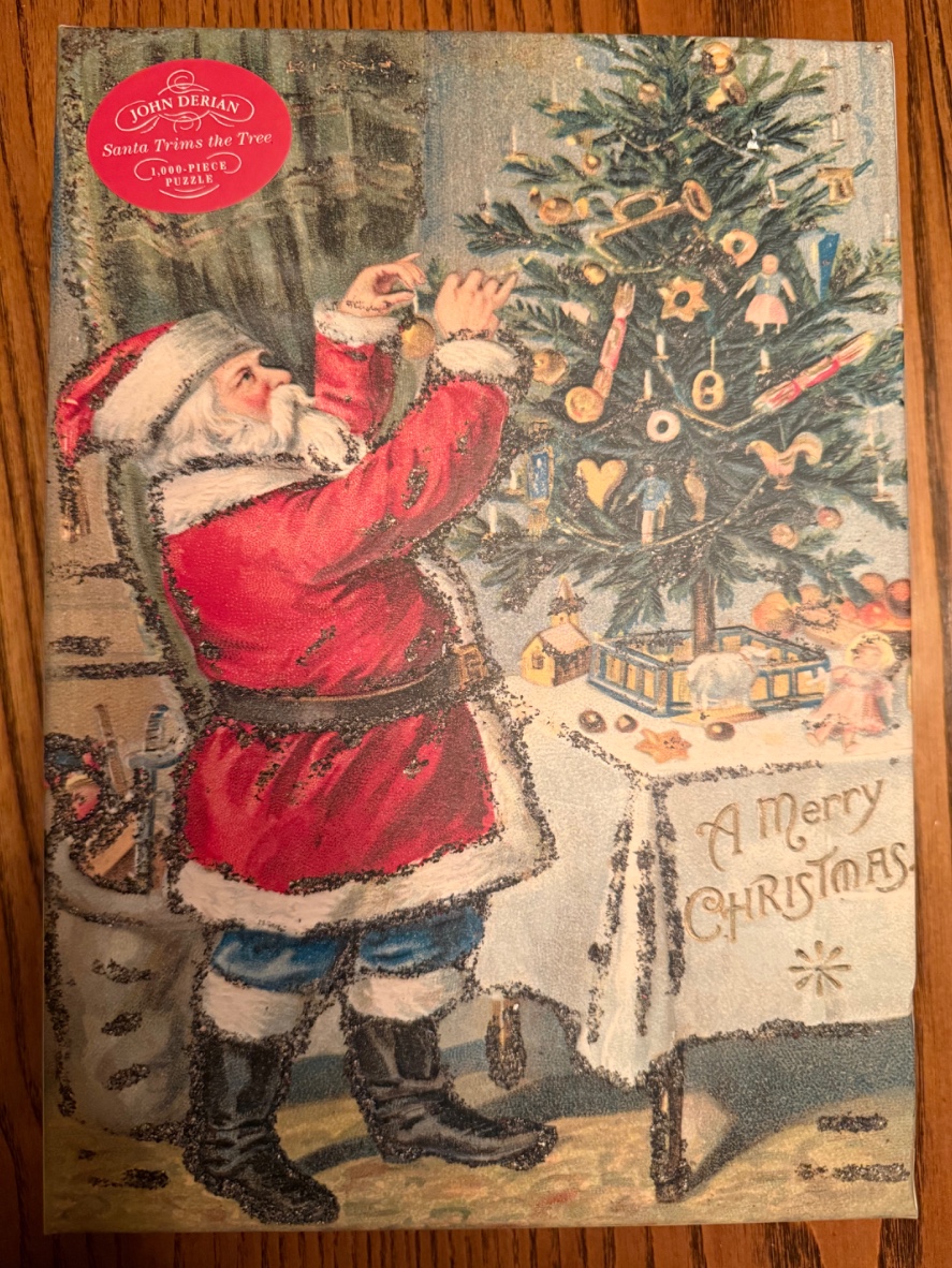 Vintage illustration of Santa Claus decorating a Christmas tree with the text A Merry Christmas.