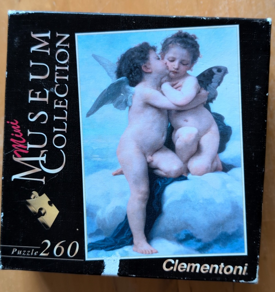 A classical oil painting showing two winged cupids or cherubs embracing and kissing against a blue sky.