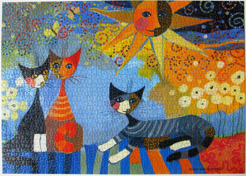 Stylized illustration of three cats beneath a bright sun, featuring vibrant colors and whimsical patterns.