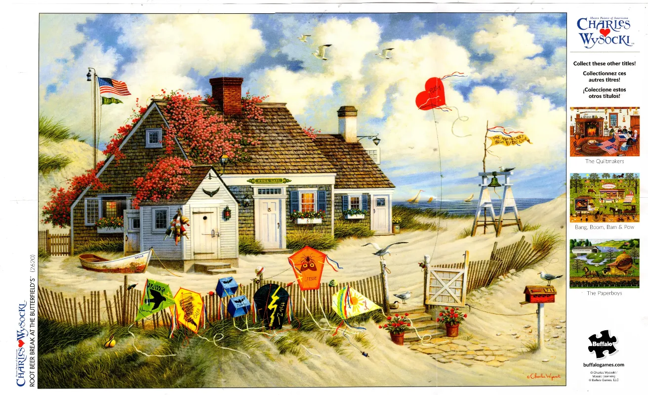 A beach house at dusk with kites flying, dunes, and a lifeguard chair.