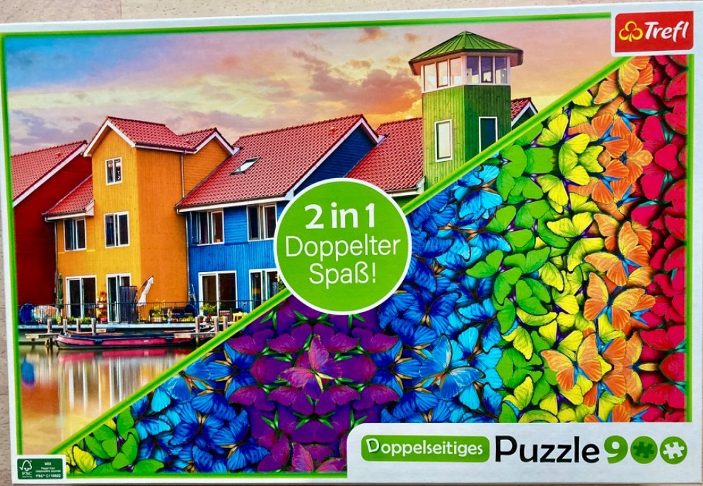 A split image showing a colorful seaside town with a lighthouse on one side and a collage of rainbow butterflies on the other