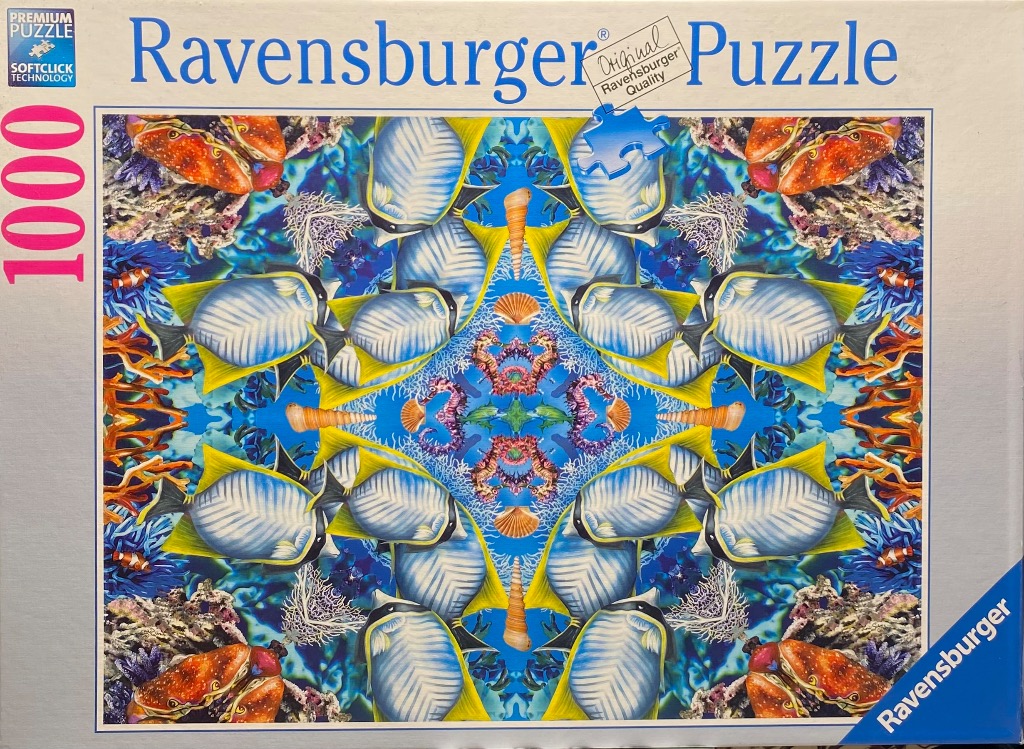 A kaleidoscopic, symmetrical underwater scene featuring butterflyfish, seahorses, crabs, and coral.