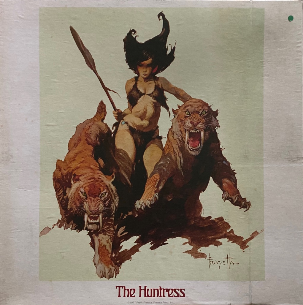 A female huntress with a spear and two saber-toothed tigers in a fantasy illustration.