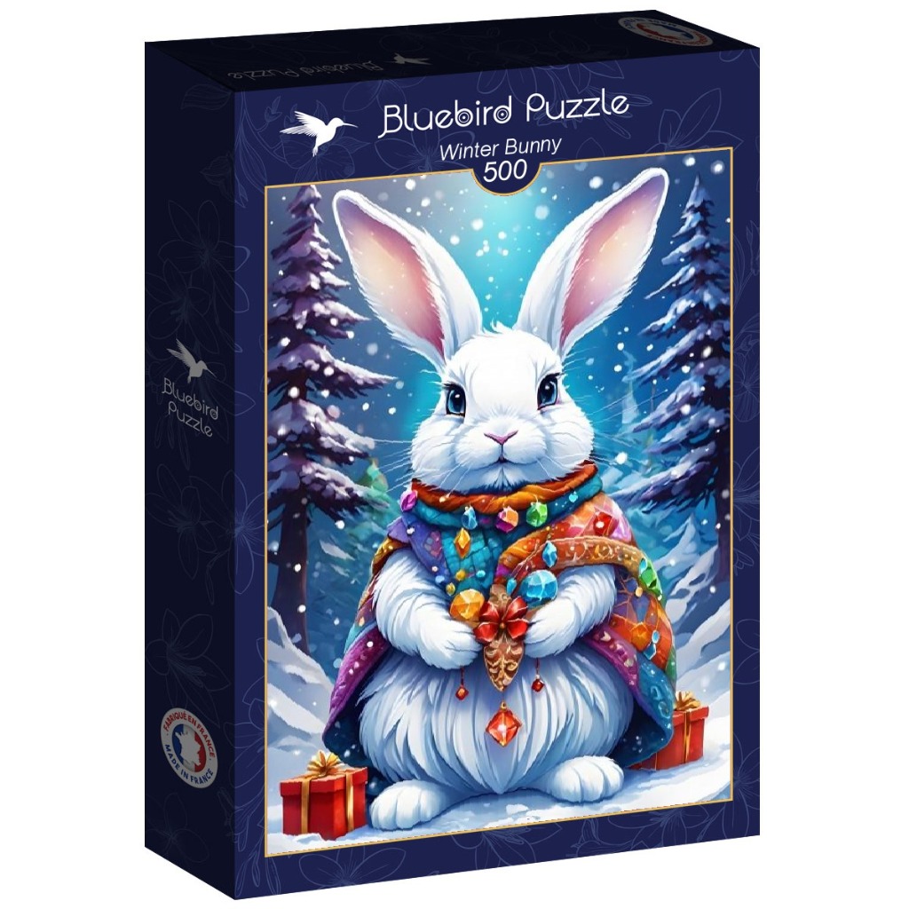 A fluffy white bunny wearing a colorful, gem-encrusted winter cape in a snowy forest with gift boxes.