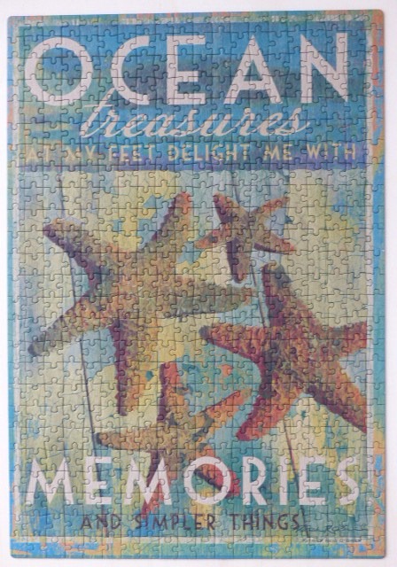 A vintage-style poster featuring four starfish on a weathered wood background with the text Ocean Treasures Memories.