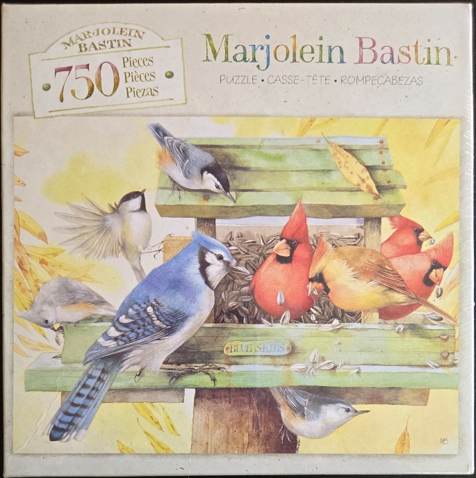Watercolor illustration of several wild birds visiting a wooden bird feeder against a soft yellow background.