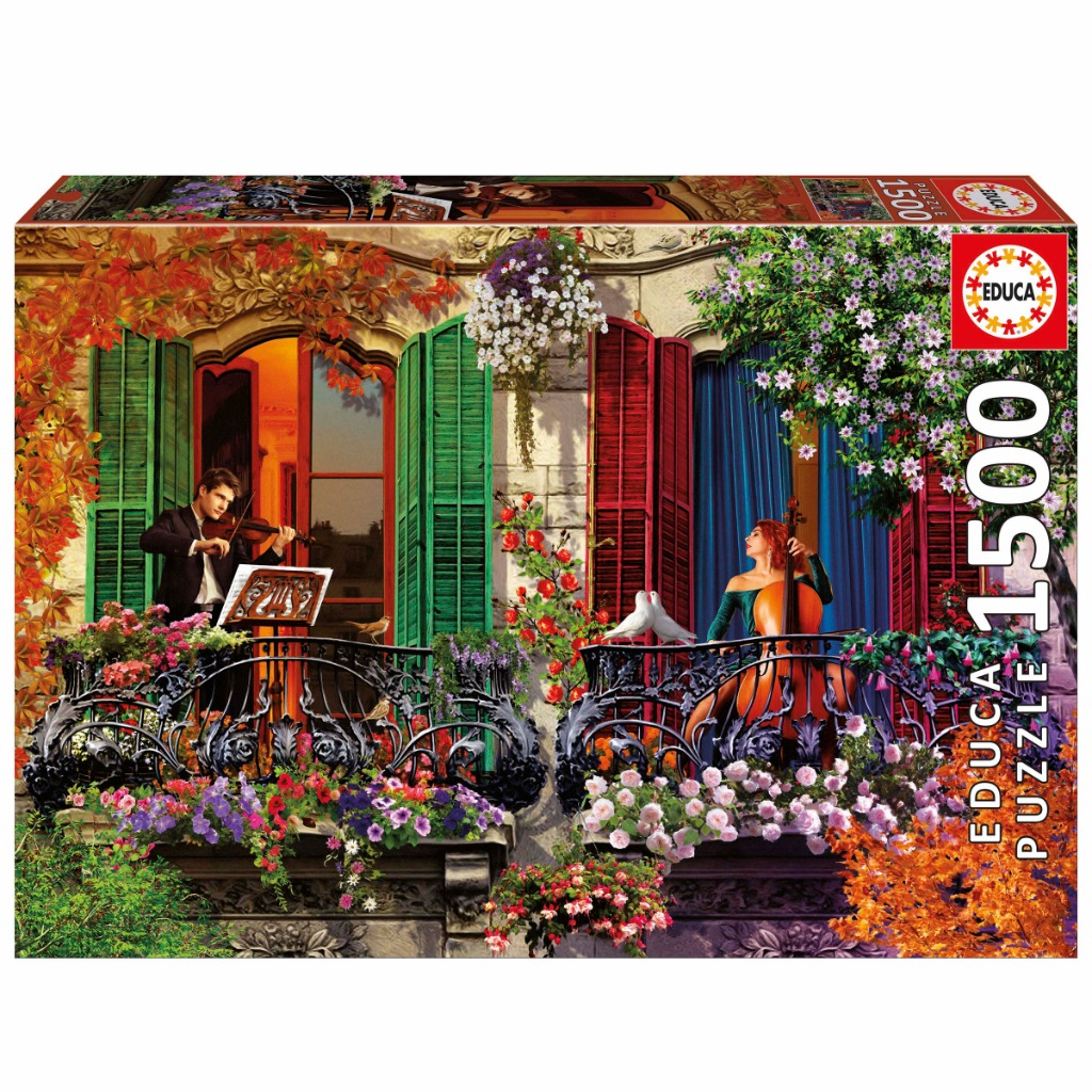 A male violinist and female cellist performing on a colorful, flower-filled balcony at dusk.