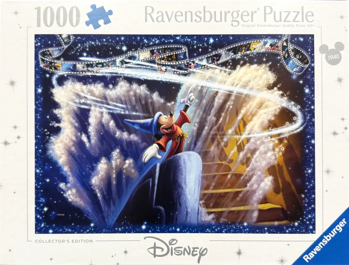Mickey Mouse as the Sorcerer's Apprentice standing atop a rock surrounded by magical water and a film strip.