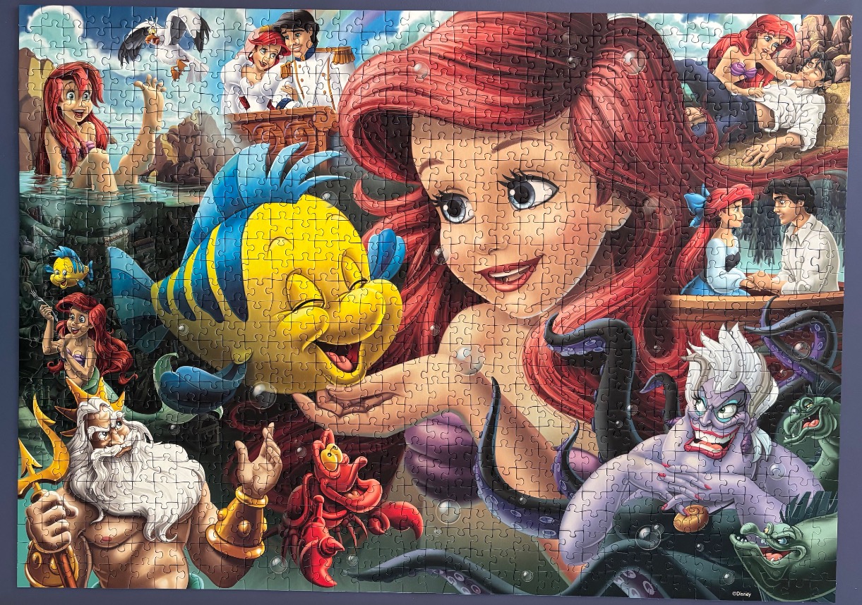Collage of characters from The Little Mermaid featuring Ariel, Flounder, Sebastian, King Triton, and Ursula.