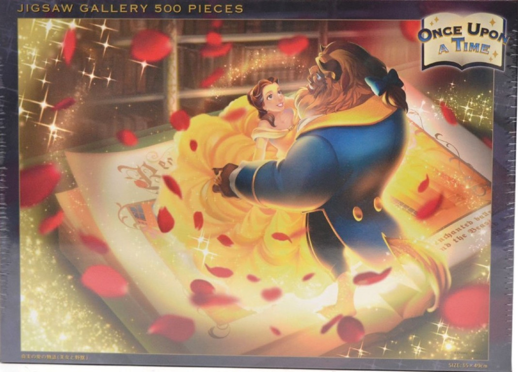 Belle and the Beast dancing on a giant open book surrounded by falling red rose petals.