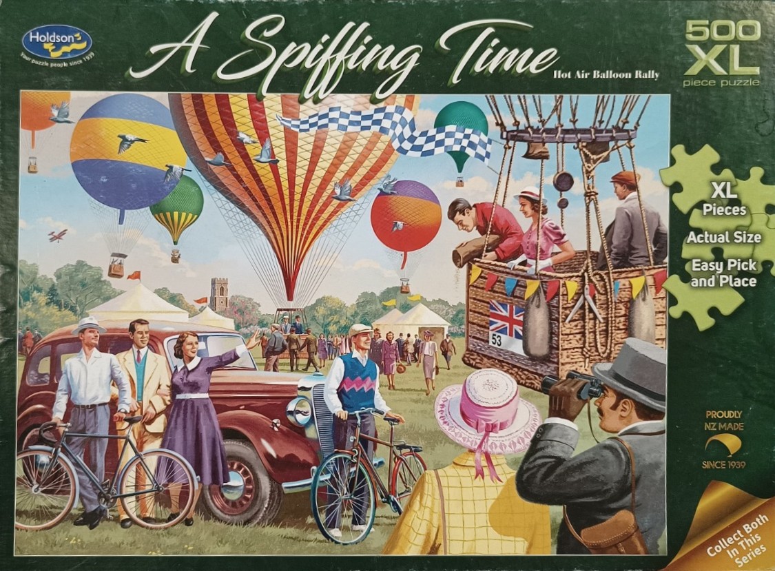 An illustration of a vintage 1940s-style hot air balloon rally with people, classic cars, and bicycles in a grassy field.