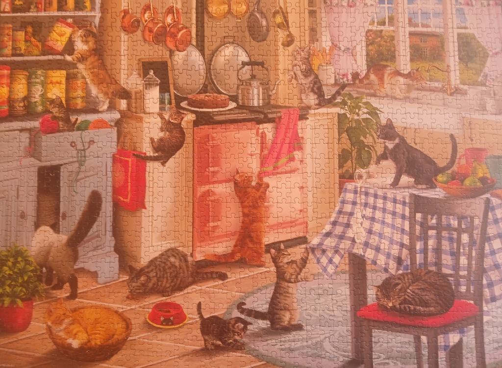 A warm-toned, detailed illustration of numerous mischievous cats playing in a cozy country kitchen.