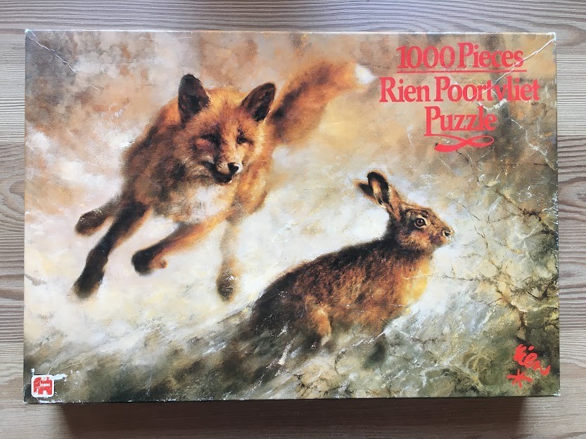 An oil painting of a red fox leaping toward a brown hare in a misty field.