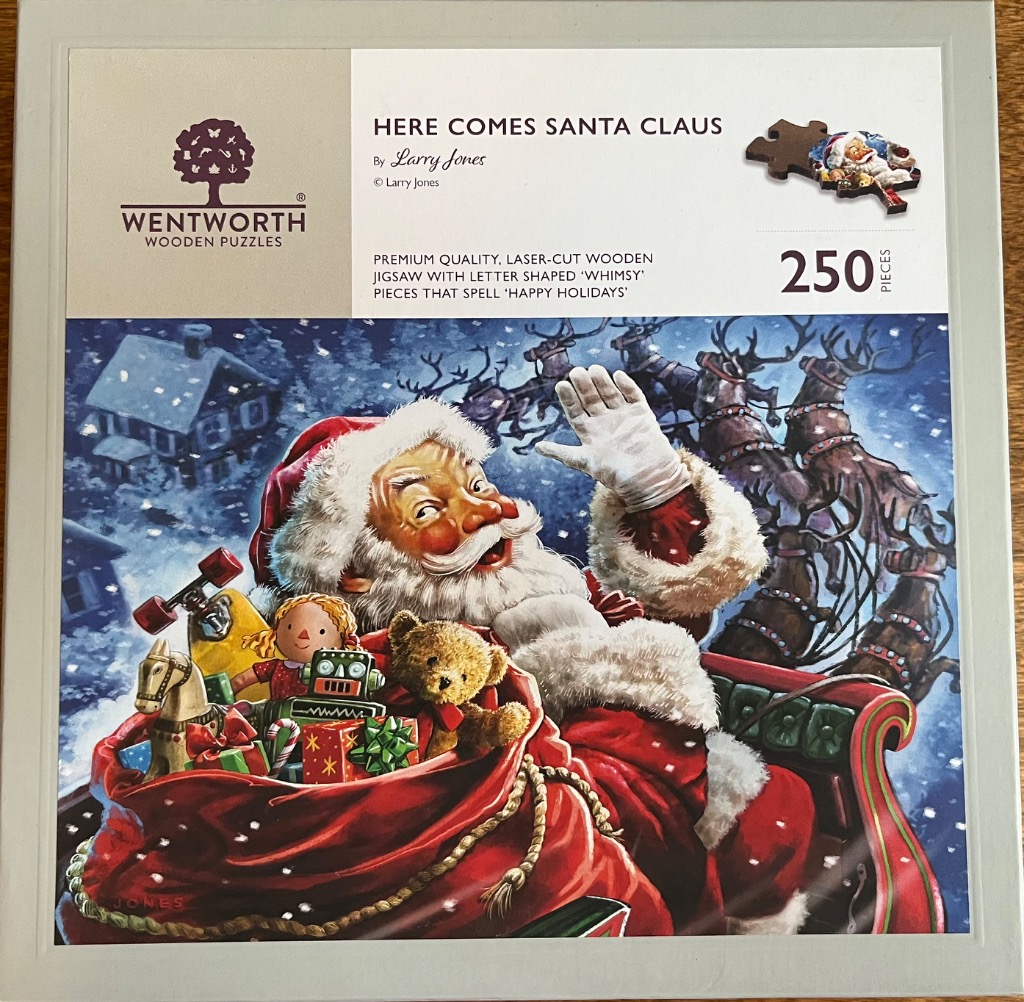 Santa Claus in his sleigh filled with toys against a snowy night sky