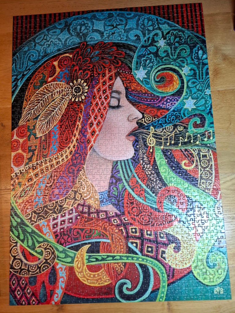 A profile portrait of a woman surrounded by vibrant, ornate patterns and musical notes in an Art Nouveau style.