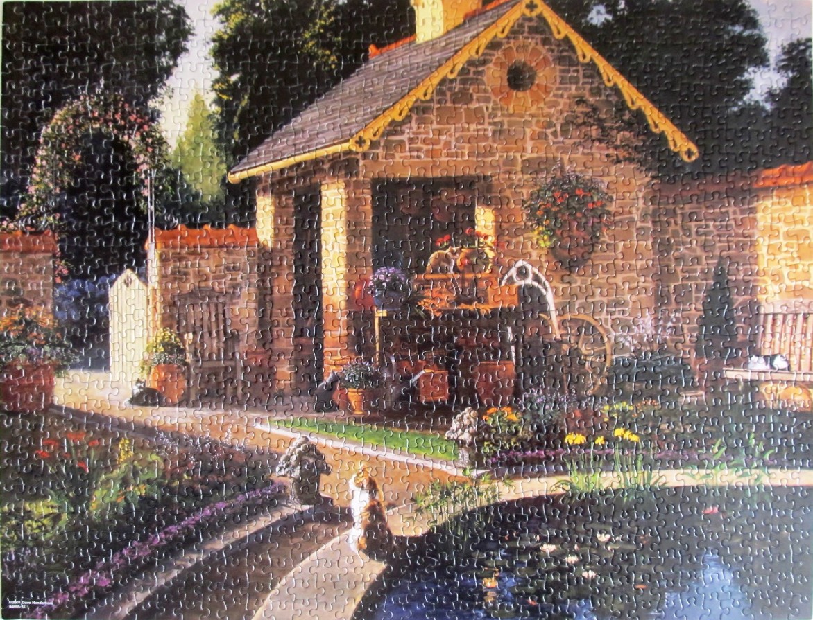 A sunny, detailed painting of a brick garden shed surrounded by lush flowers and cats near a lily pond.