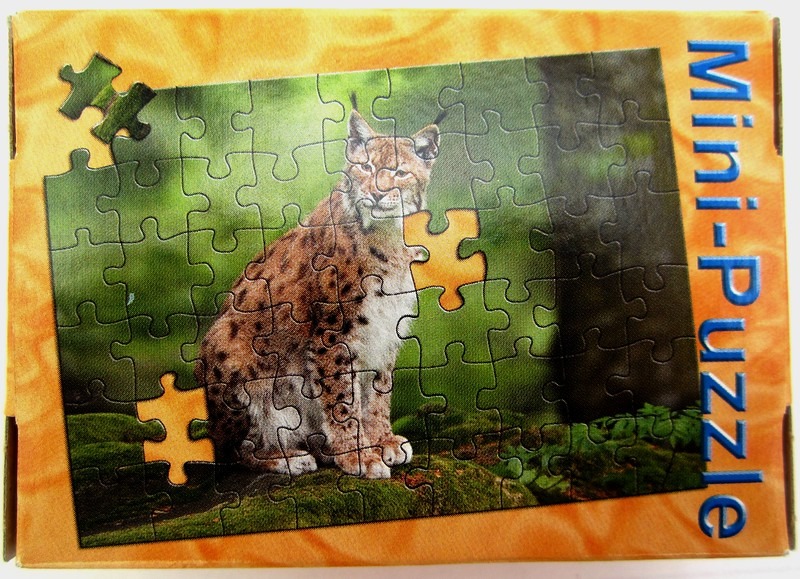A lynx sitting in a forest, depicted as a partially completed image with a few missing pieces.