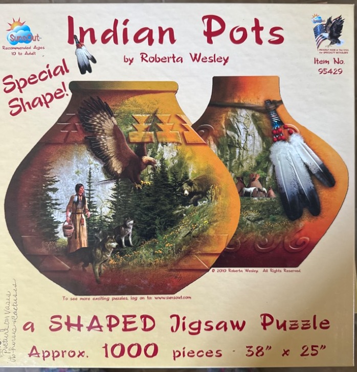 Artwork of two earthen pots decorated with Native American-themed wilderness imagery featuring eagles, wolves, and a figure.