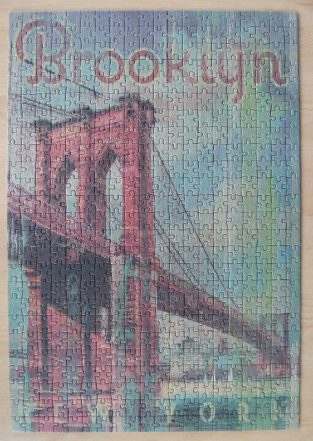 An artistic illustration of the Brooklyn Bridge with stylized text against a muted, painterly background.