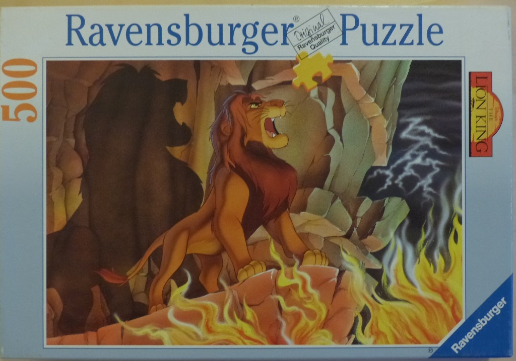 Scar from The Lion King roaring in front of a dark, rocky cliff face with flames at his feet.