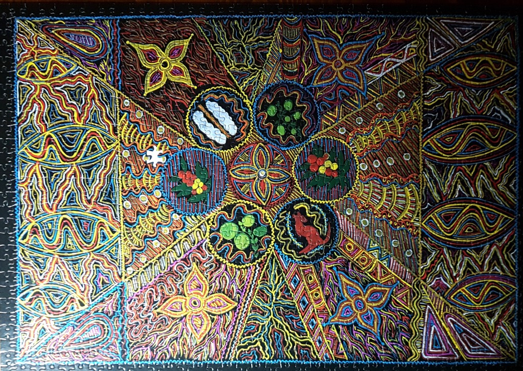 An intricate Aboriginal-style dot painting featuring radial patterns, geometric shapes, and circular nature motifs.