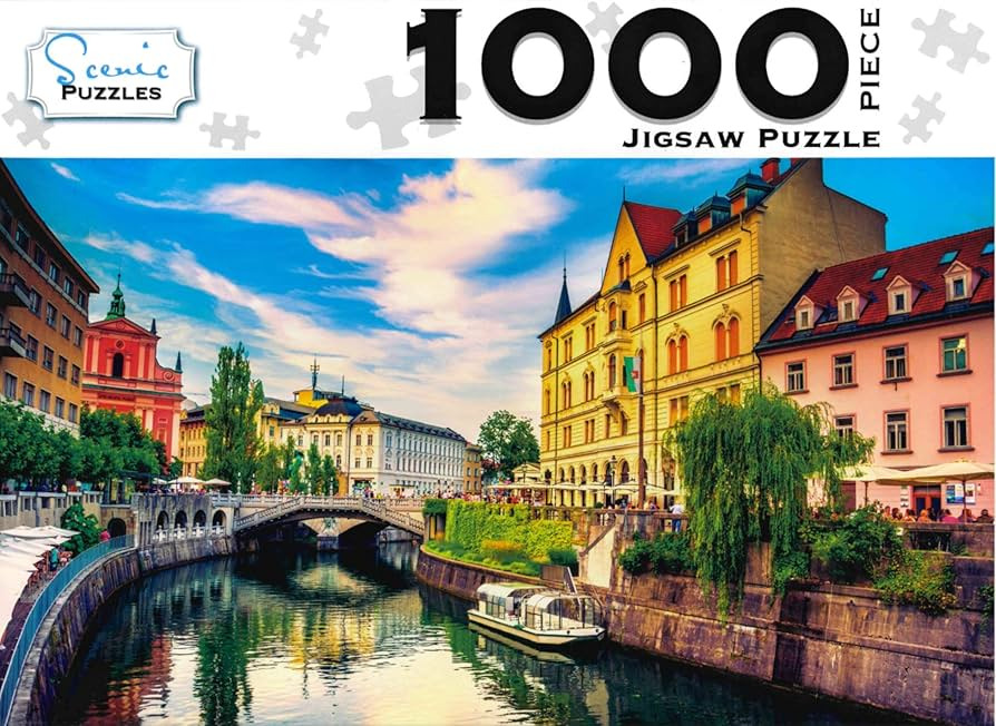A scenic view of the Ljubljanica river flowing through Ljubljana, Slovenia, lined with pastel buildings.