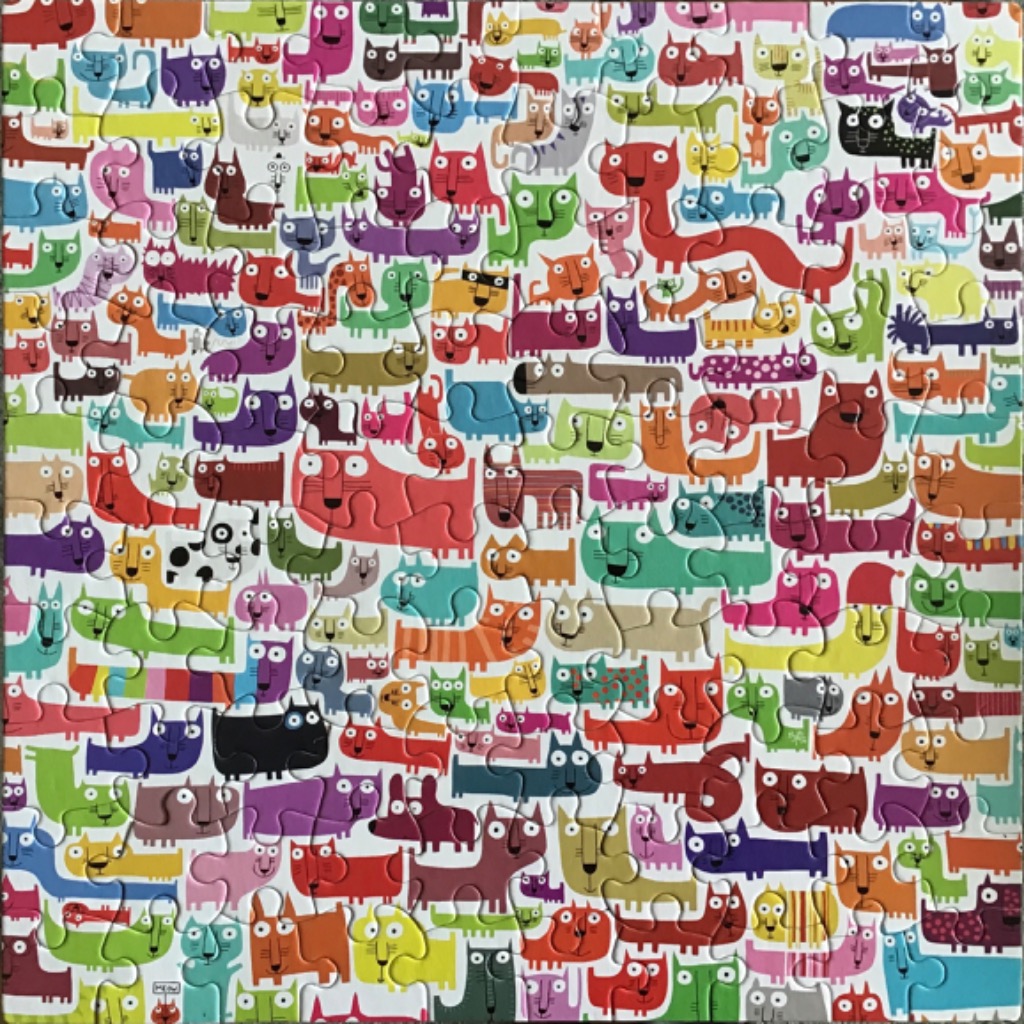 A whimsical pattern of many colorful, stylized cats in various shapes and sizes covering the entire frame.
