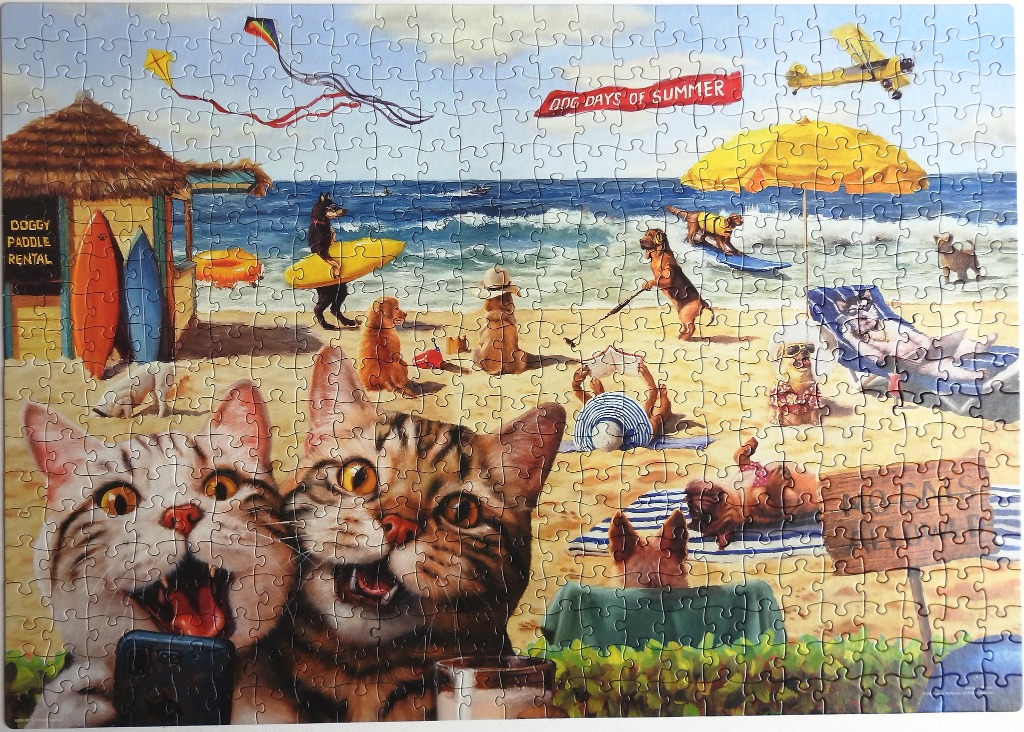 Cartoon scene of dogs and cats at a beach, with two cats taking a selfie in the foreground.