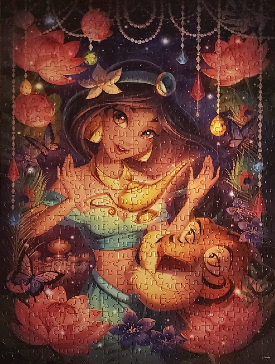 Princess Jasmine and Rajah the tiger surrounded by lotus flowers and sparkling hanging crystals.