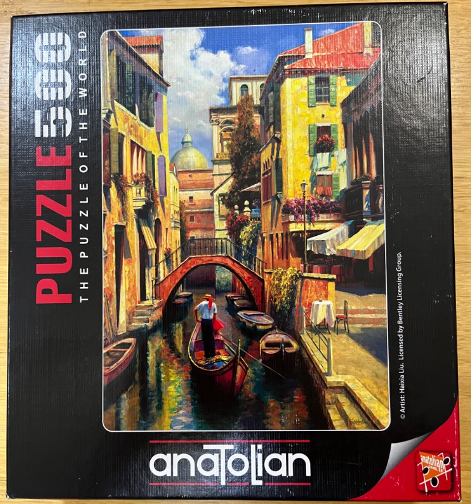 An oil painting of a Venetian canal scene with a gondolier and colorful buildings.